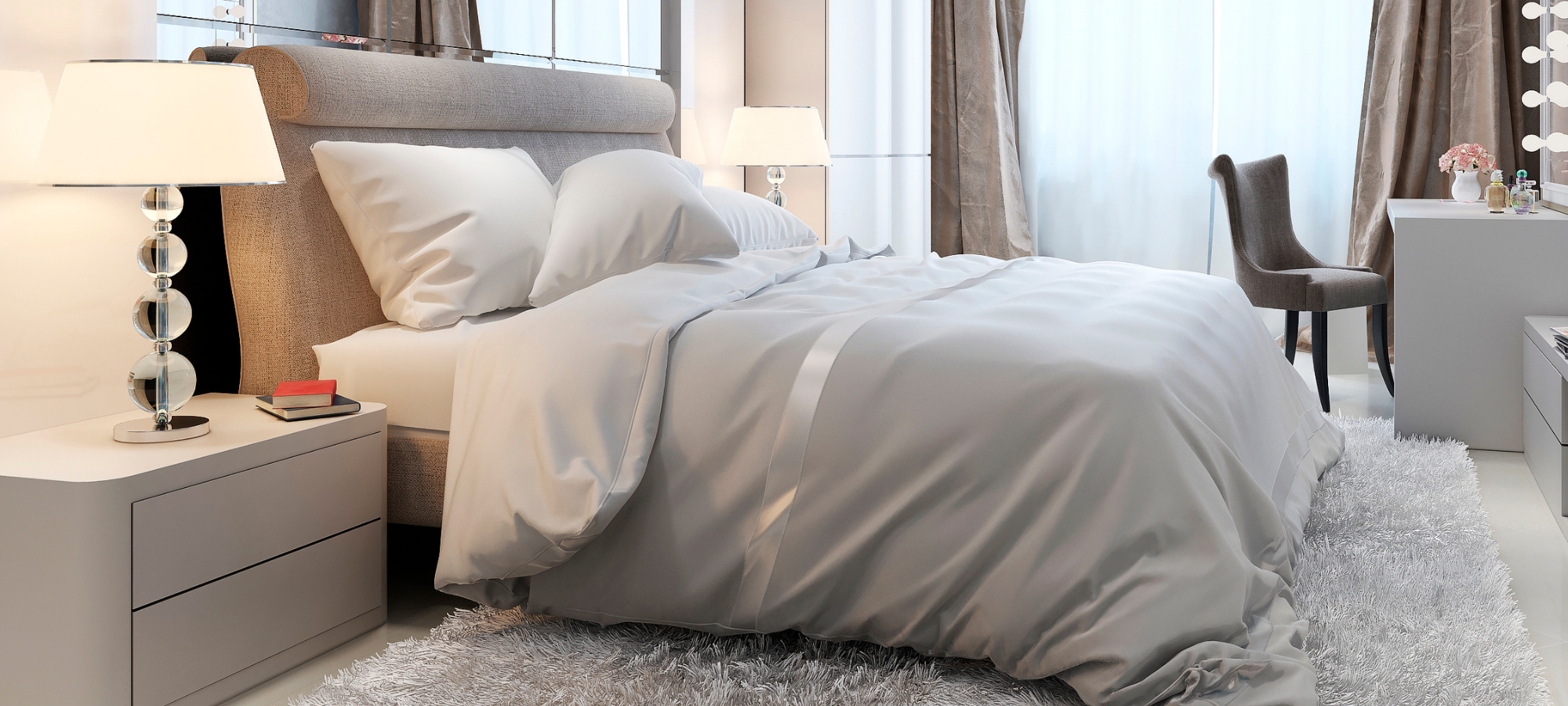 Household Textile Cleaning 1 cozy bedroom with large bed with white bedding on plush white rug
