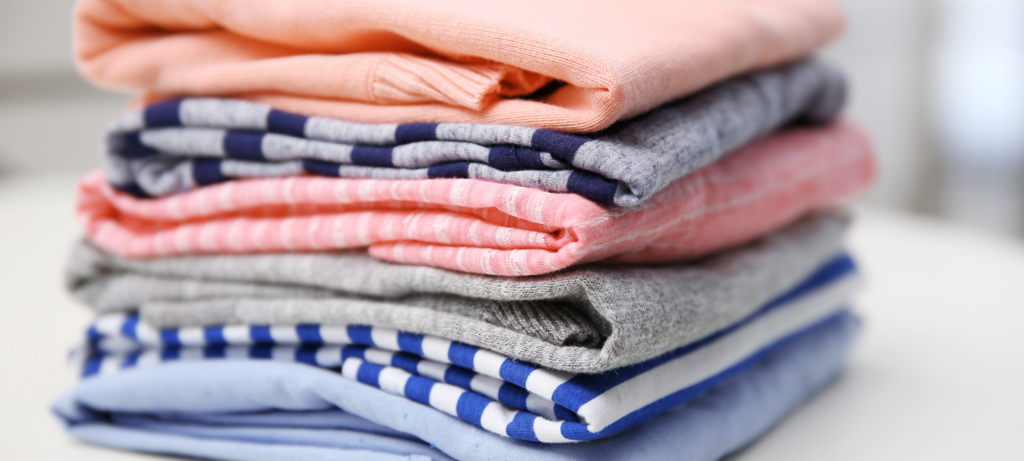 Wash & Fold 1 Neatly folded clean towels representing professional wash and fold laundry care